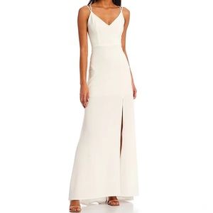 B. Darlin White Backless Dress with Tail